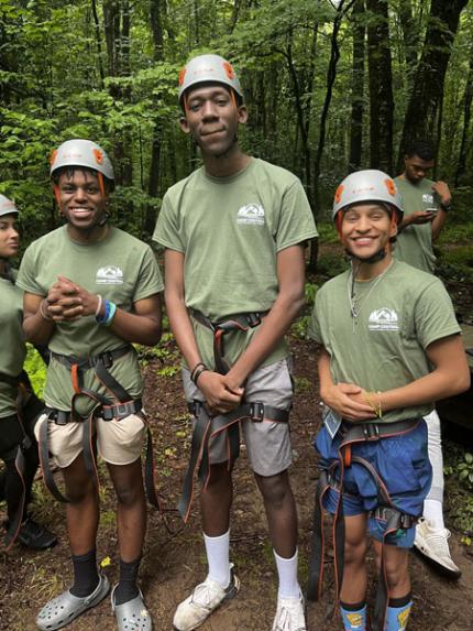 Students ready to use a zipline