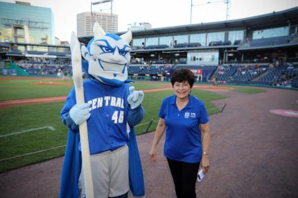 Kizer the Blue Devil and Central President Zulma R. Toro at Dunkin stadium.