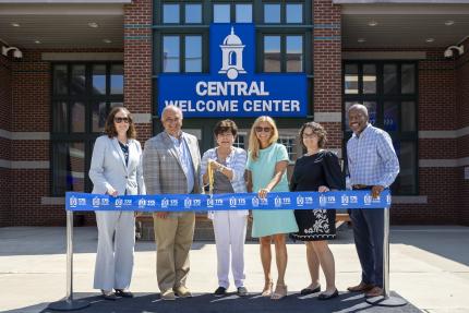 Central Welcome Center ribbon-cutting group photo