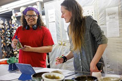 ceramics student with professor