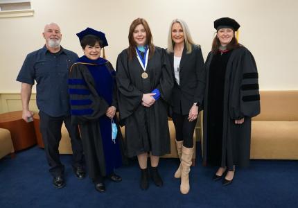 Blake Decoteau and her family with President Toro and Provost Kostelis