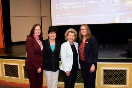 Provost Kimberly Kostelis; President Zulma R. Toro; Joan Woodward of Travelers; and School of Business Dean Lisa Frank at the 2025 American Savings Foundation lecture.