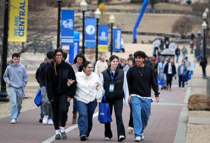 Students tour the Central campus during spring Accepted Students Day.