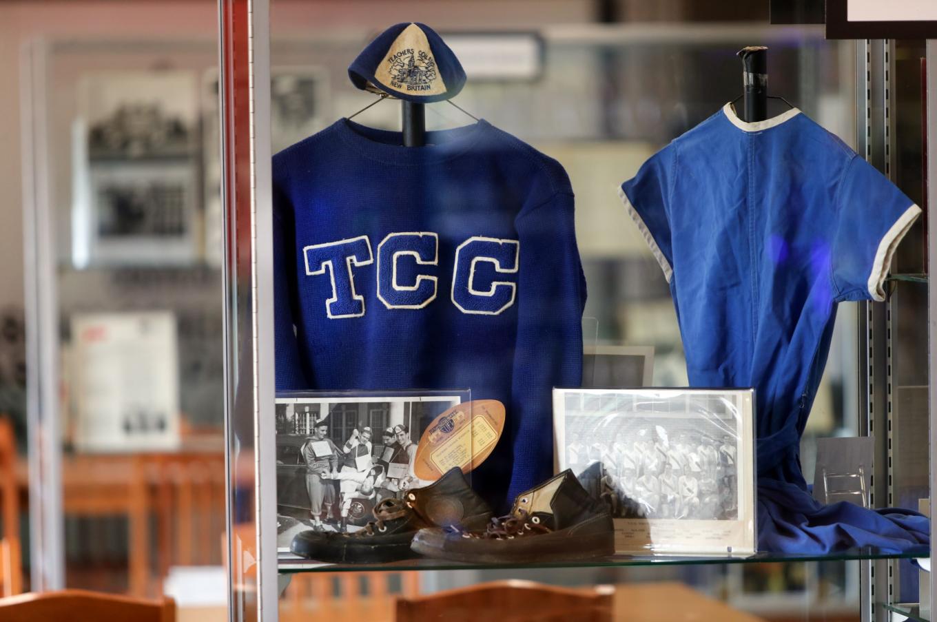 Vintage athletic clothes on display in the Burritt Library's 175th anniversary exhibit.