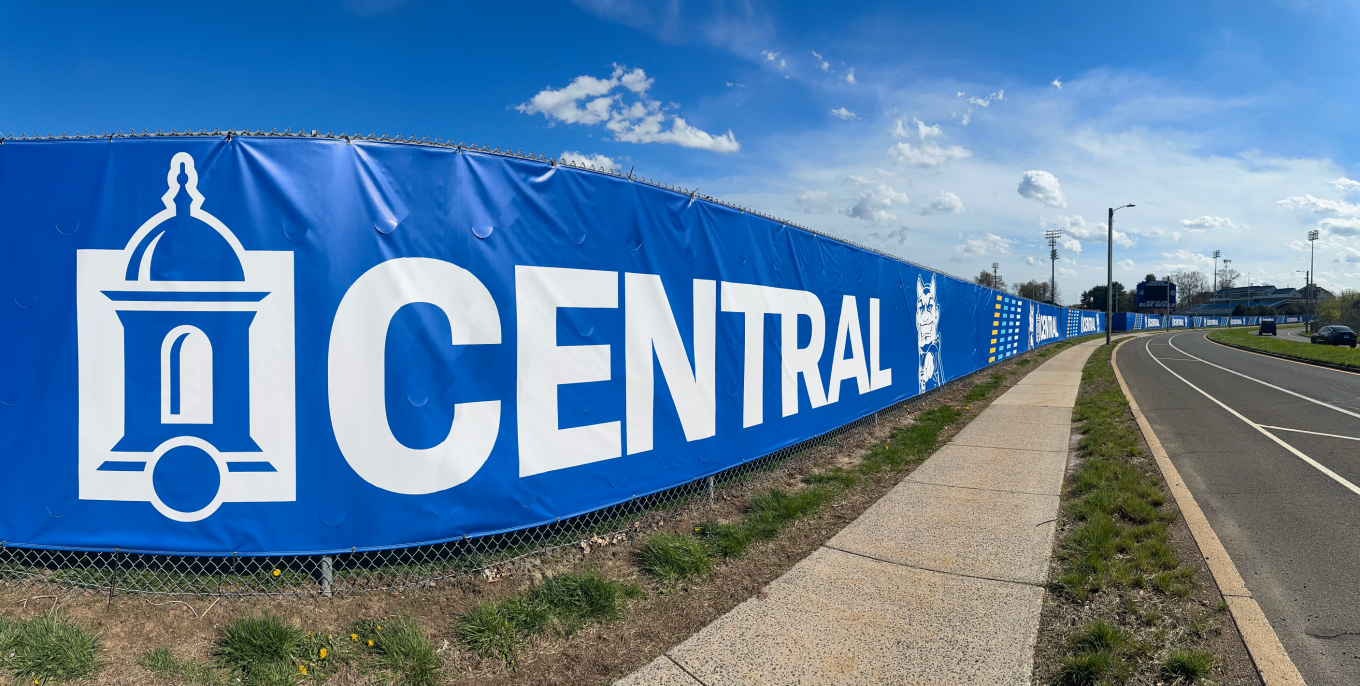 Central's new fence signage near Arute field