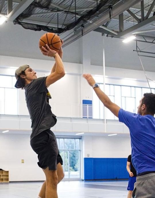 Students playing basketball