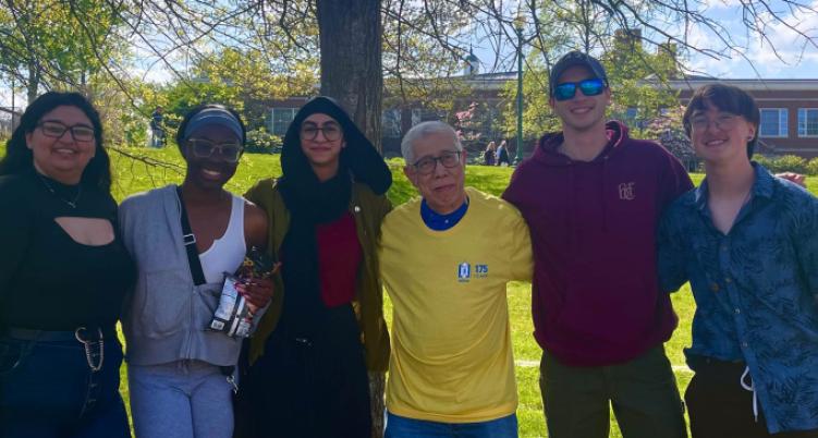 students and teacher outside